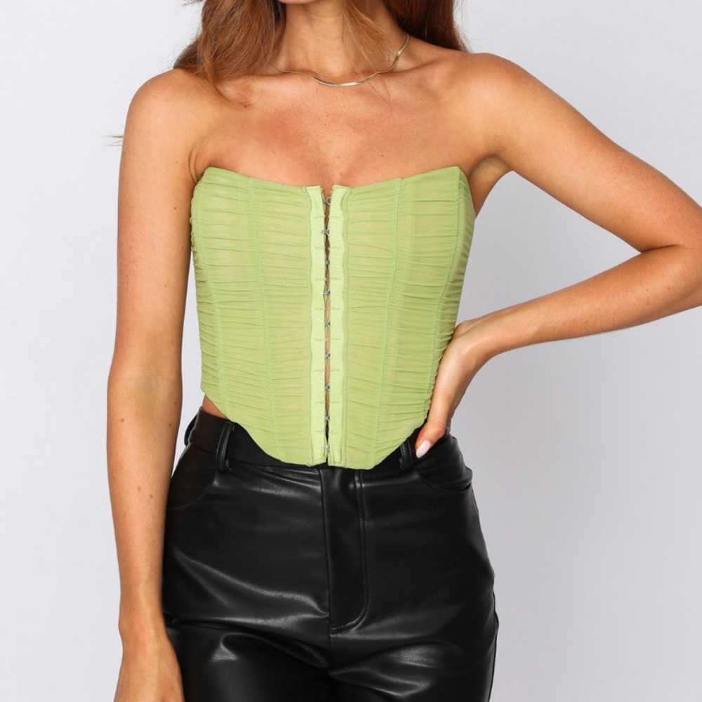 White fox green corset.